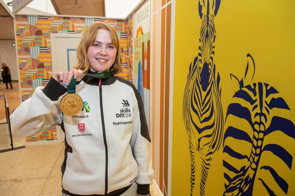 Bygningsmalerlærling Camilla Lindholm Gelmer har vundet DM i Skills 2024. Hun er i lære hos Marlenes Malerfirma i Varde. Foto Søren Hytting.